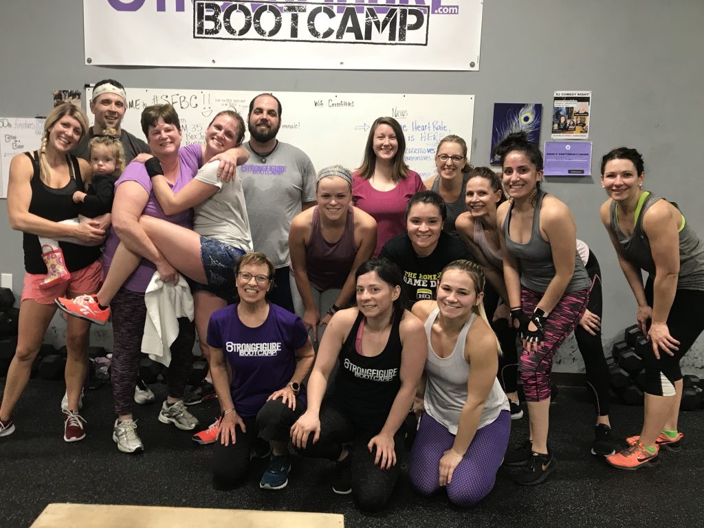 strongfigure bootcamp class posing for a photo